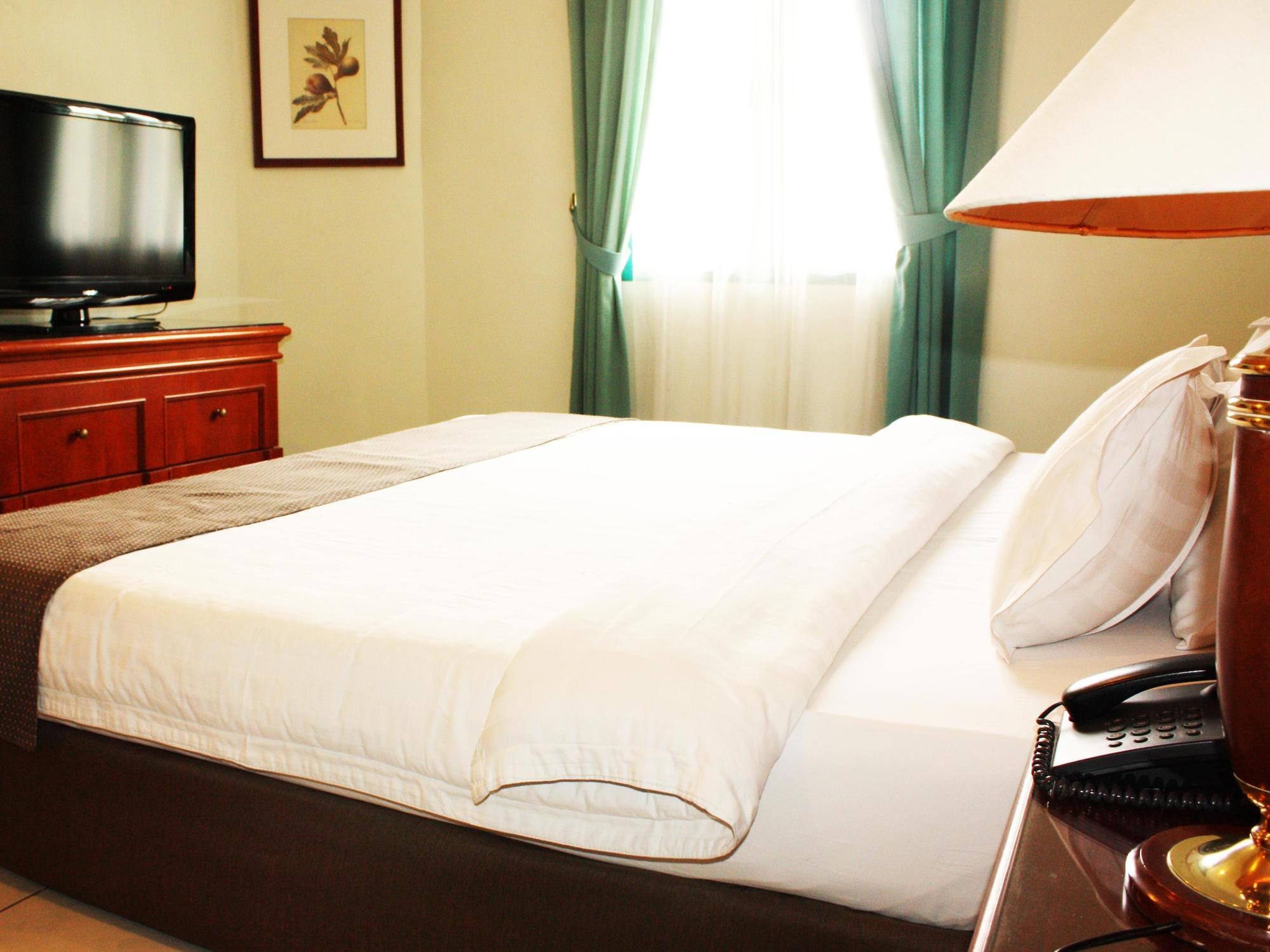 Travellers Suites Apartamentos con servicio Medan Exterior foto