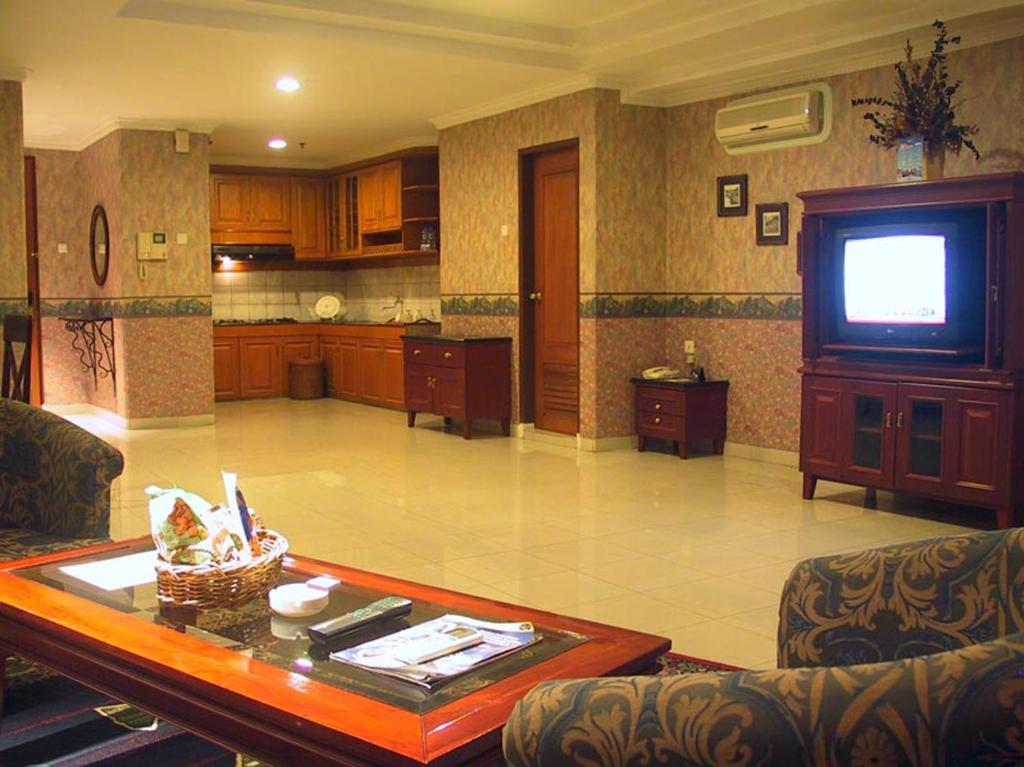 Travellers Suites Apartamentos con servicio Medan Habitación foto